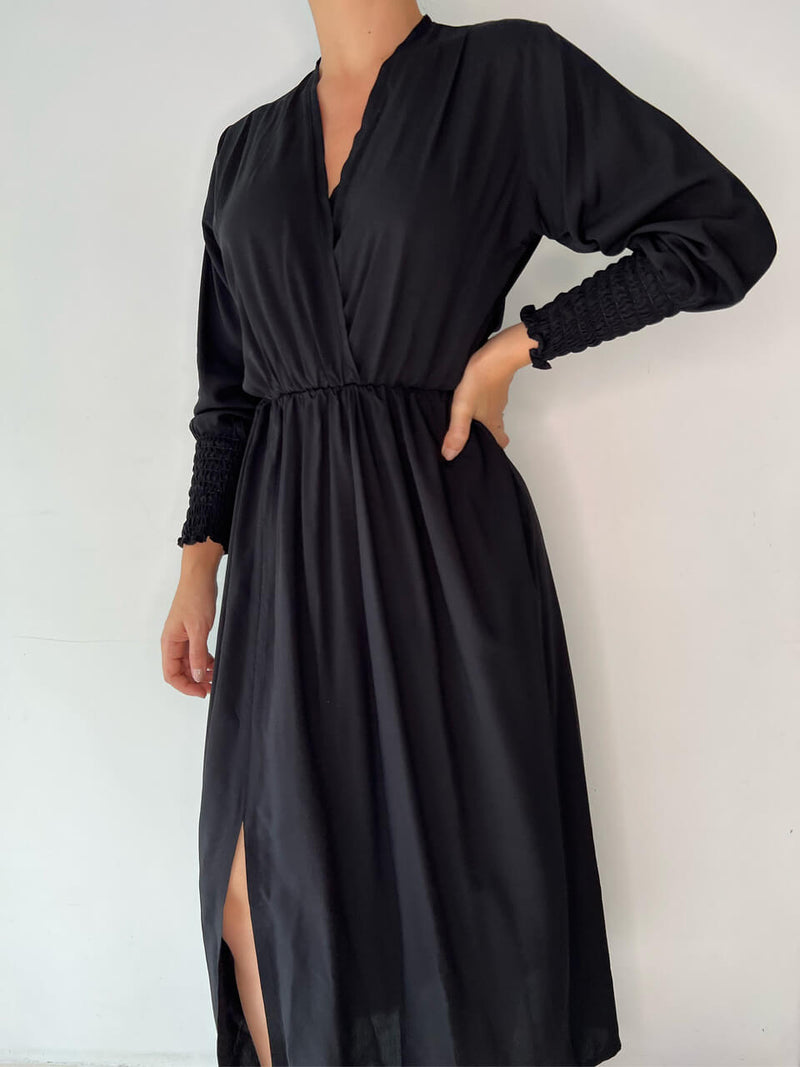 Vestido negro escote online en v